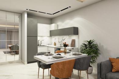 Alanya eiendom: Moderne kjøkken og spiseområde med marmor benkeplater og stilige, nøytrale møbler under sterk belysning.